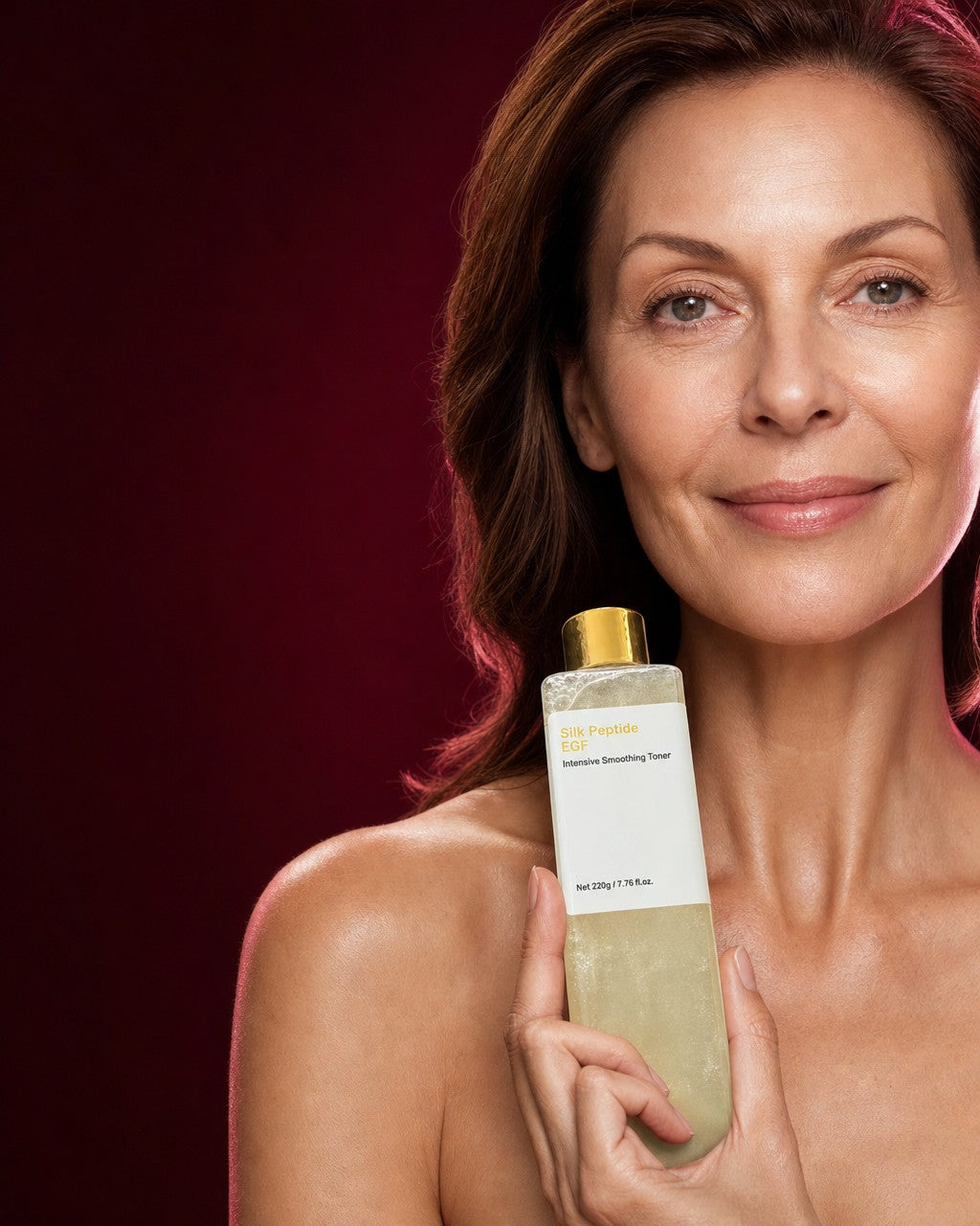 Woman holding the toner bottle near her collarbone